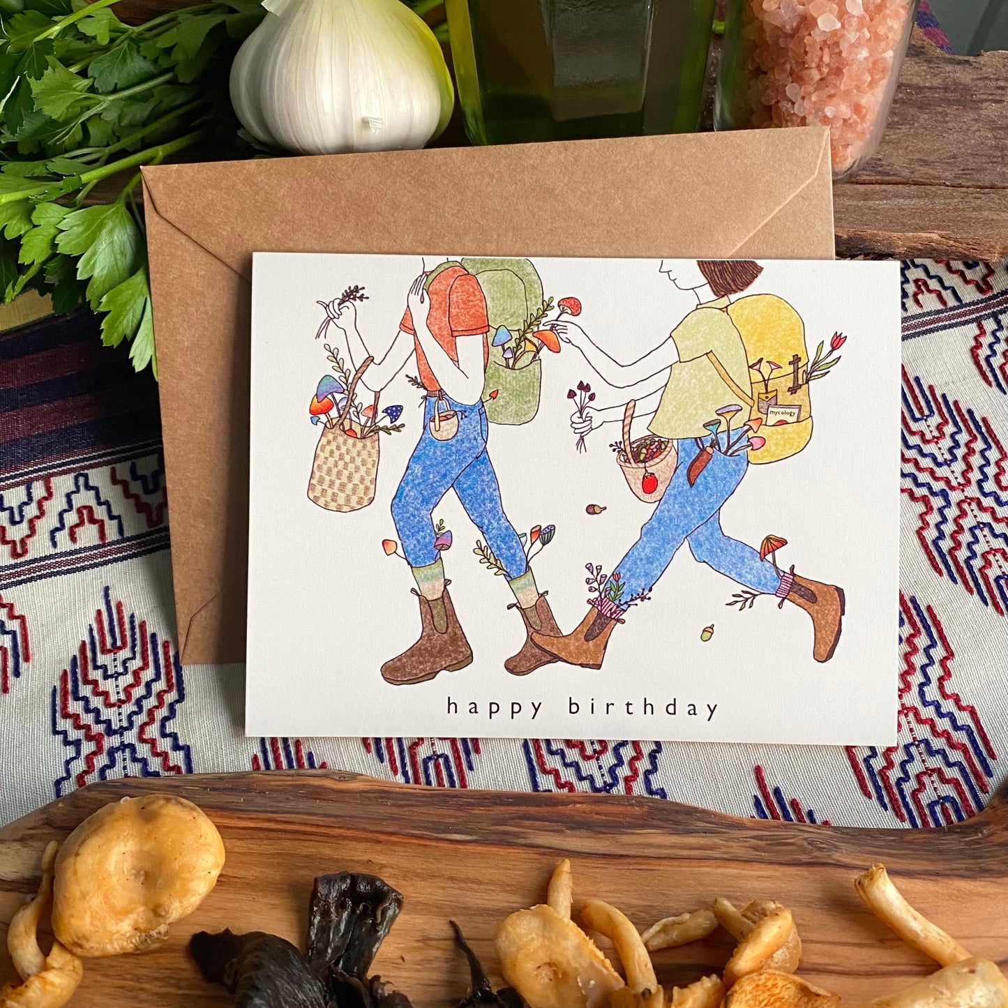 Birthday Card Set with an illustration of two hikers foraging mushrooms together