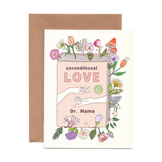 Greeting card with floral book design and text 'unconditional love' 
