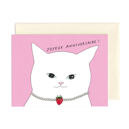 Cute French Birthday Card with illustration of a white cat wearing pearl necklace with a strawberry pendant on a pink background 