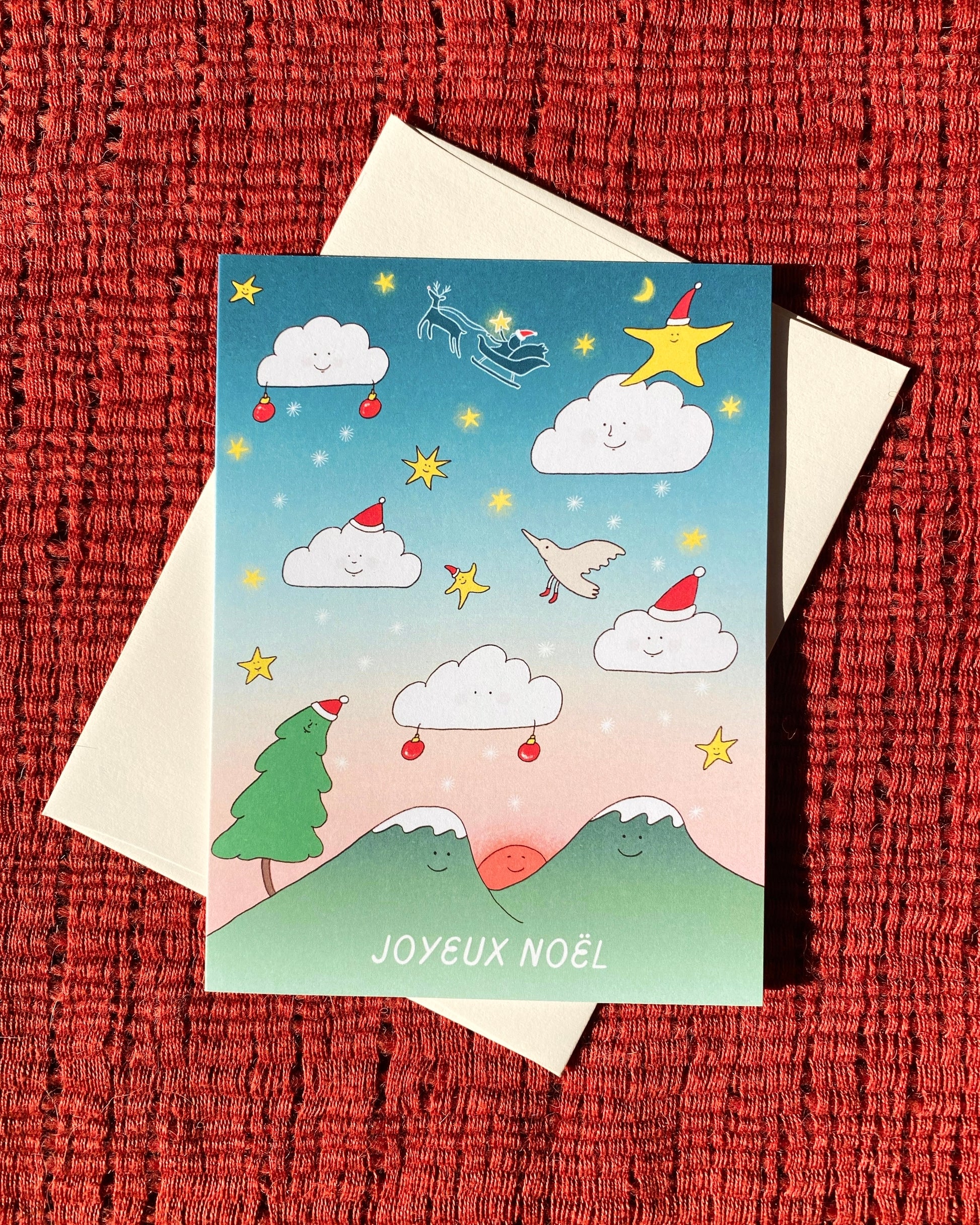 Unique and cute french Holiday Card set with the illustration of the moon, the sun, dreamy sky with clouds, stars birds and mountains
