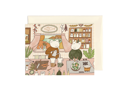 Illustration of two frogs in a cozy kitchen making coffee and breakfast together