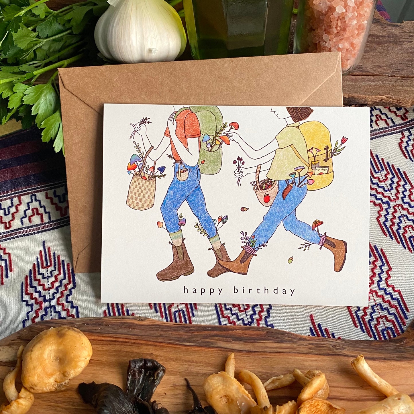 Birthday Card Set with an illustration of two hikers foraging  mushrooms together