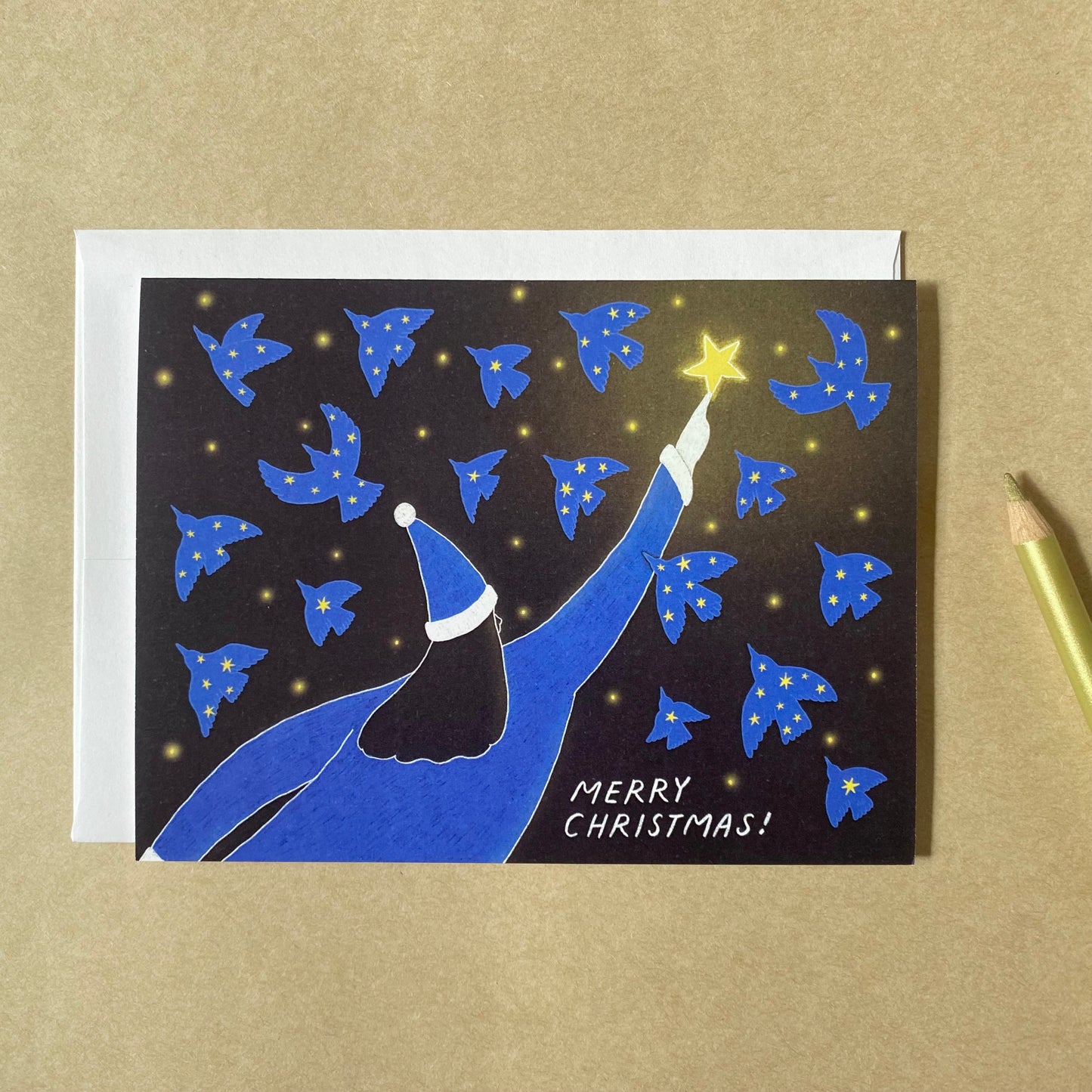 Dreamy holiday cards with the illustration of lots of birds flying with the starry sky in their bodies and the woman Santa Claus reaching out to one of the stars