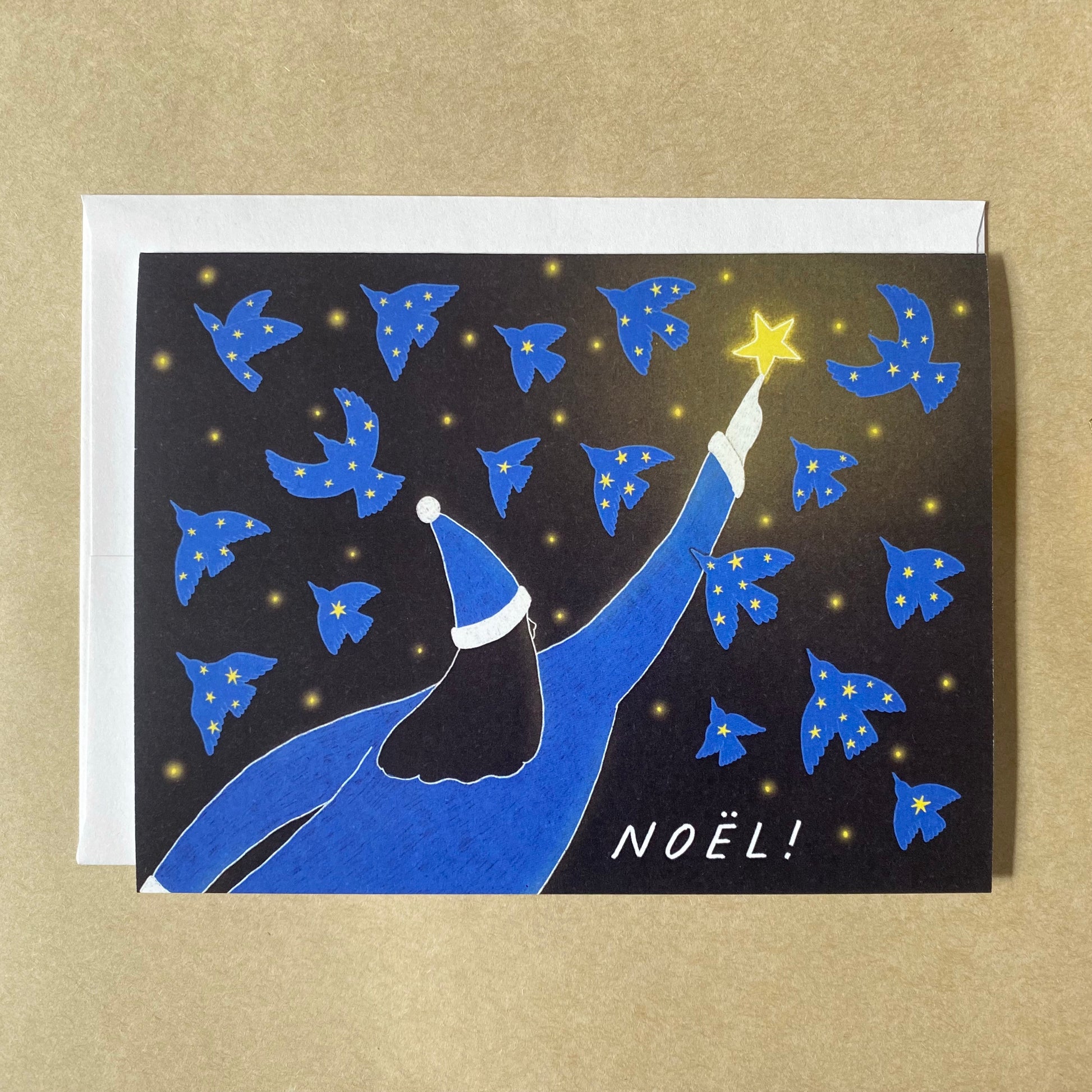 Dreamy french holiday cards with the illustration of lots of birds flying with the starry sky in their bodies and the woman Santa Claus reaching out to one of the stars