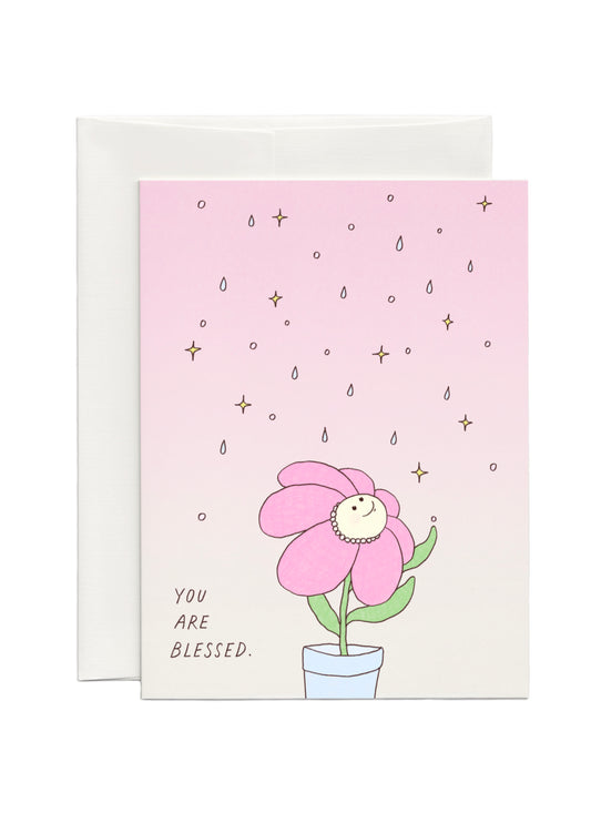 Cute Just because Card with the illustration of a pink flower smiling and looking up the sparks above her